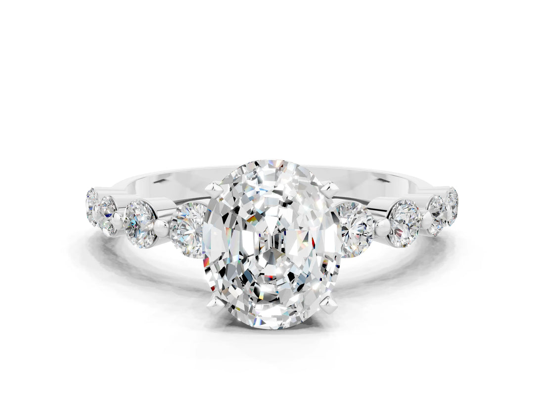 White gold Oval Cut Solitaire Moissanite Ring with Pave Band and Four-Prong Setting