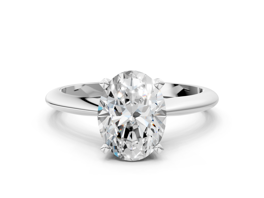 White gold Oval Cut Solitaire Ring with Four-Prong Setting on a Classic Band_114