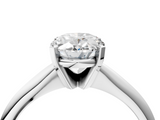 White gold Oval Cut Solitaire Ring with Four-Prong Setting on a Classic Band_116