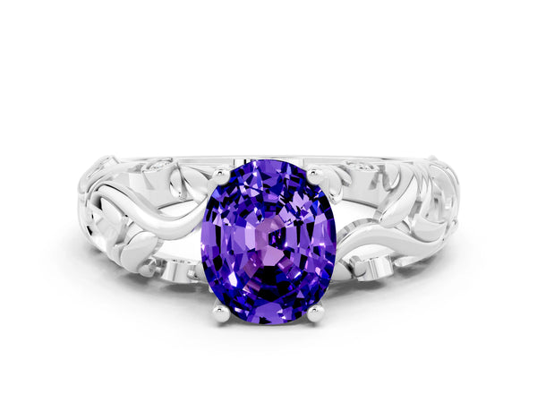 Silver Oval Cut Solitaire Tanzanite Leaf-Inspired Vine Band Ring with Prong Setting