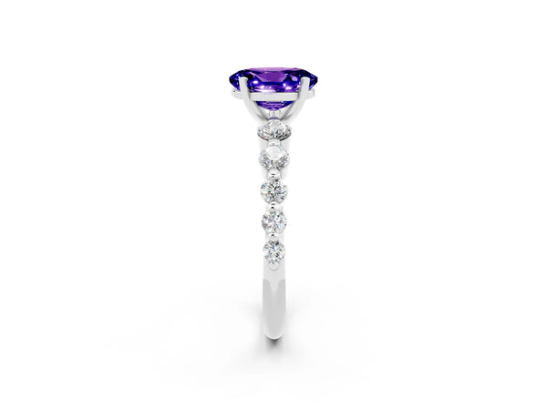 White gold Oval Cut Solitaire Tanzanite Ring with Pave Band and Four-Prong Setting