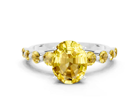 White gold Oval Cut Solitaire Yellow Sapphire Ring with Pave Band and Four-Prong Setting