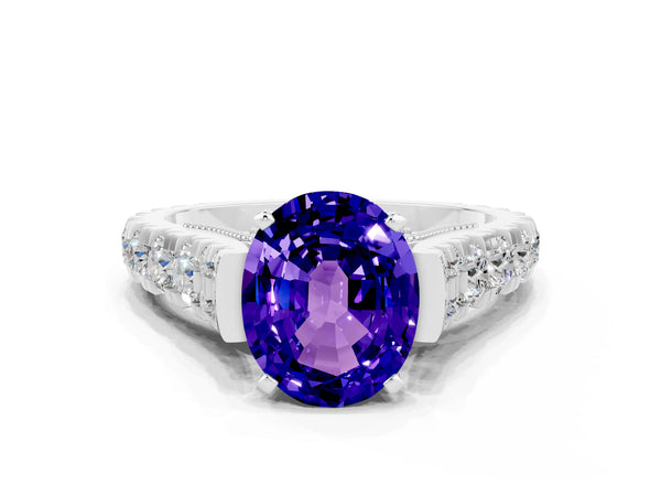 White gold Oval Cut Tanzanite Classic Solitaire Ring with Pavé Band and Four-Prong Setting