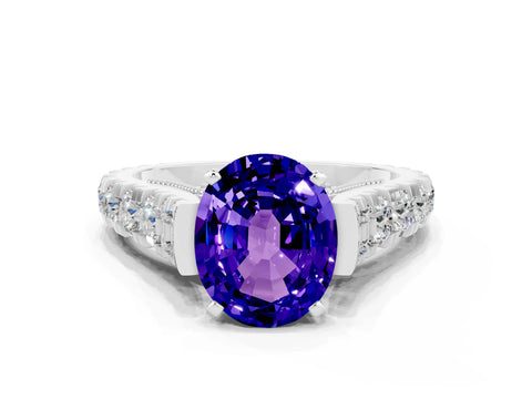 White gold Oval Cut Tanzanite Classic Solitaire Ring with Pavé Band and Four-Prong Setting