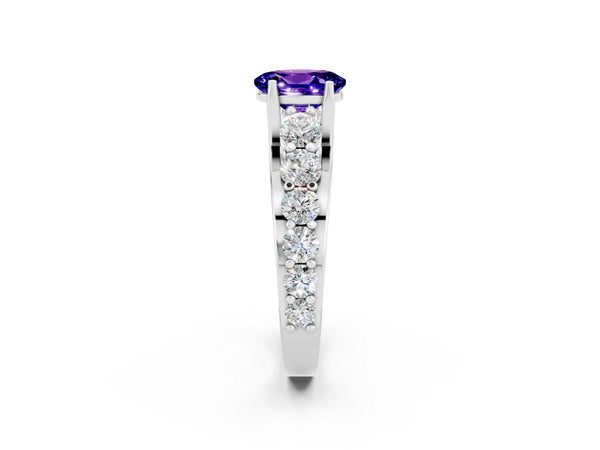 Platinum Oval Cut Tanzanite Engagement Ring with Pavé Band and Four-Prong Setting
