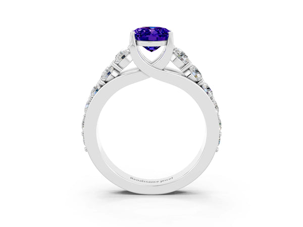 Silver Oval Cut Tanzanite Engagement Ring with Pavé Band and Four-Prong Setting