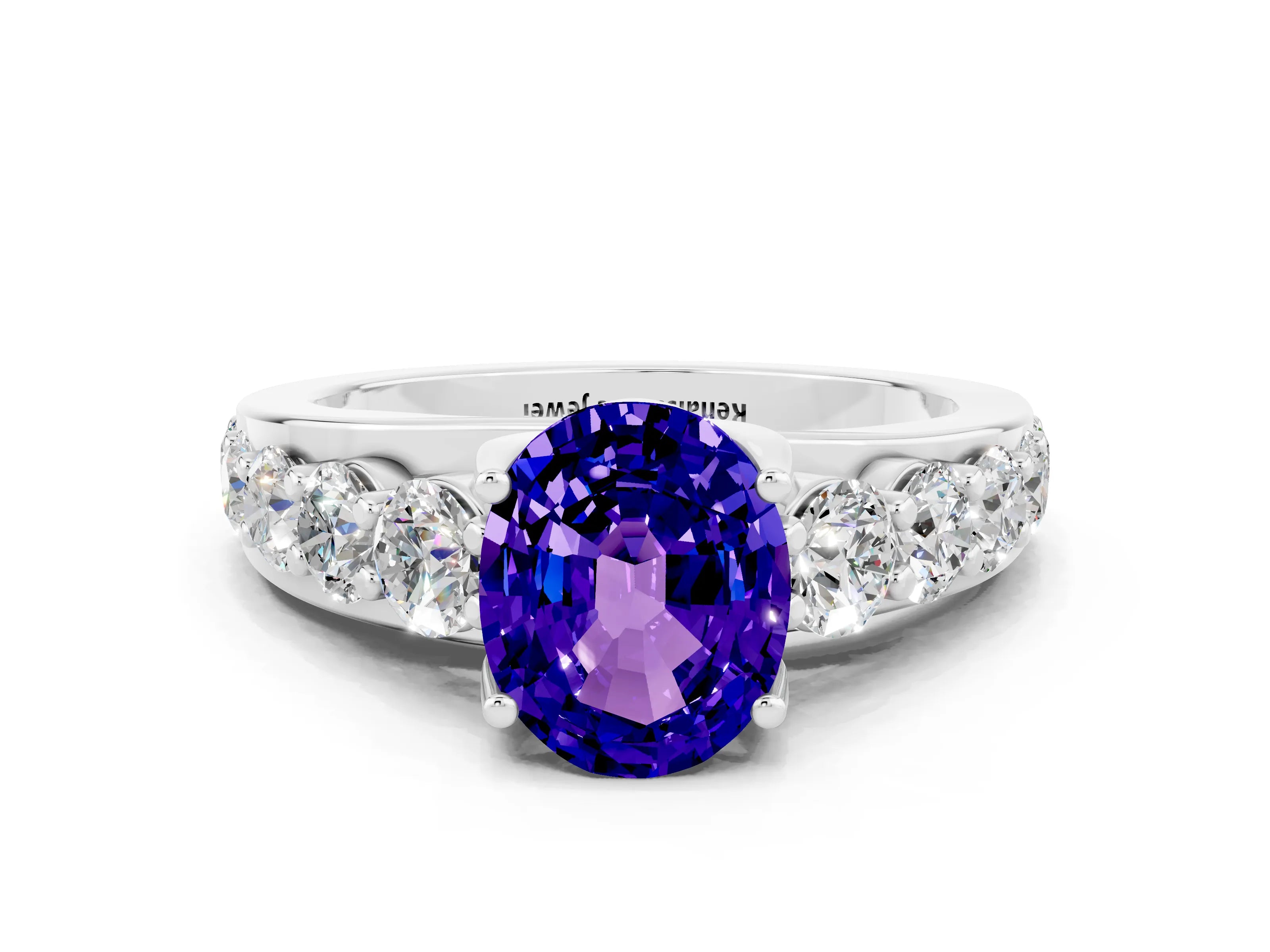 White gold Oval Cut Tanzanite Engagement Ring with Pavé Band and Four-Prong Setting