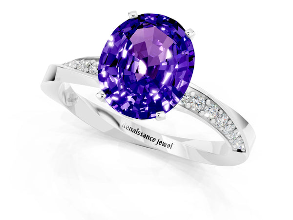 White gold Oval Cut Tanzanite Engagement Ring with Side Stone Accents and Four-Prong Setting