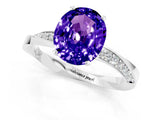 White gold Oval Cut Tanzanite Engagement Ring with Side Stone Accents and Four-Prong Setting_28