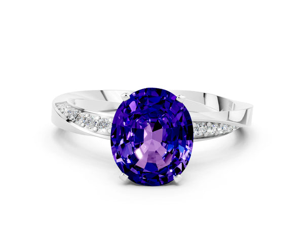 White gold Oval Cut Tanzanite Engagement Ring with Side Stone Accents and Four-Prong Setting