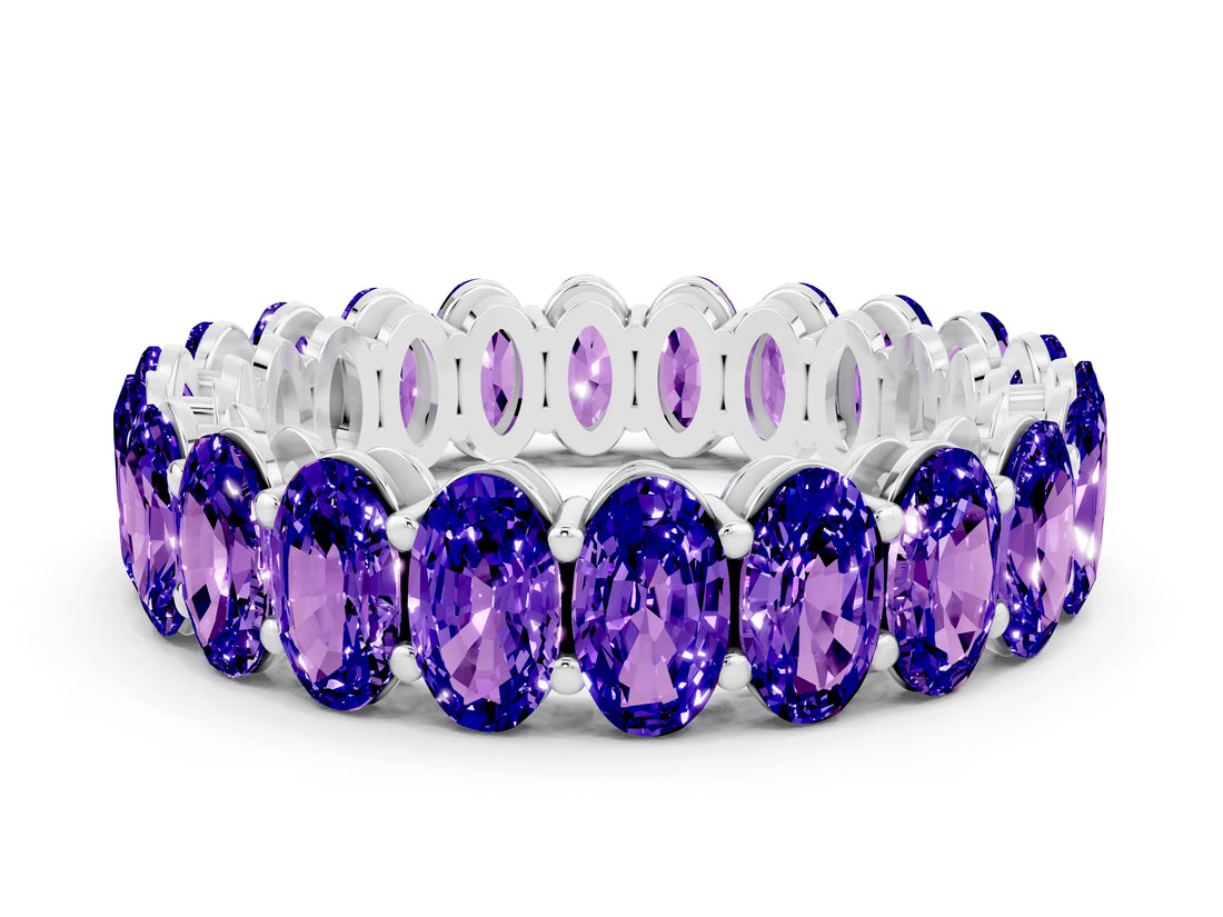 White gold Oval Cut Tanzanite Eternity Band with Shared Prong Setting
