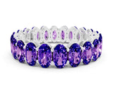 White gold Oval Cut Tanzanite Eternity Band with Shared Prong Setting