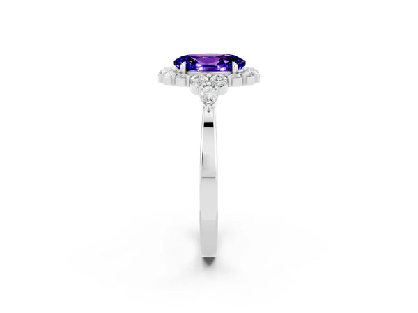 Platinum Oval Cut Tanzanite Halo Ring with Pear Side Stones and Prong Setting