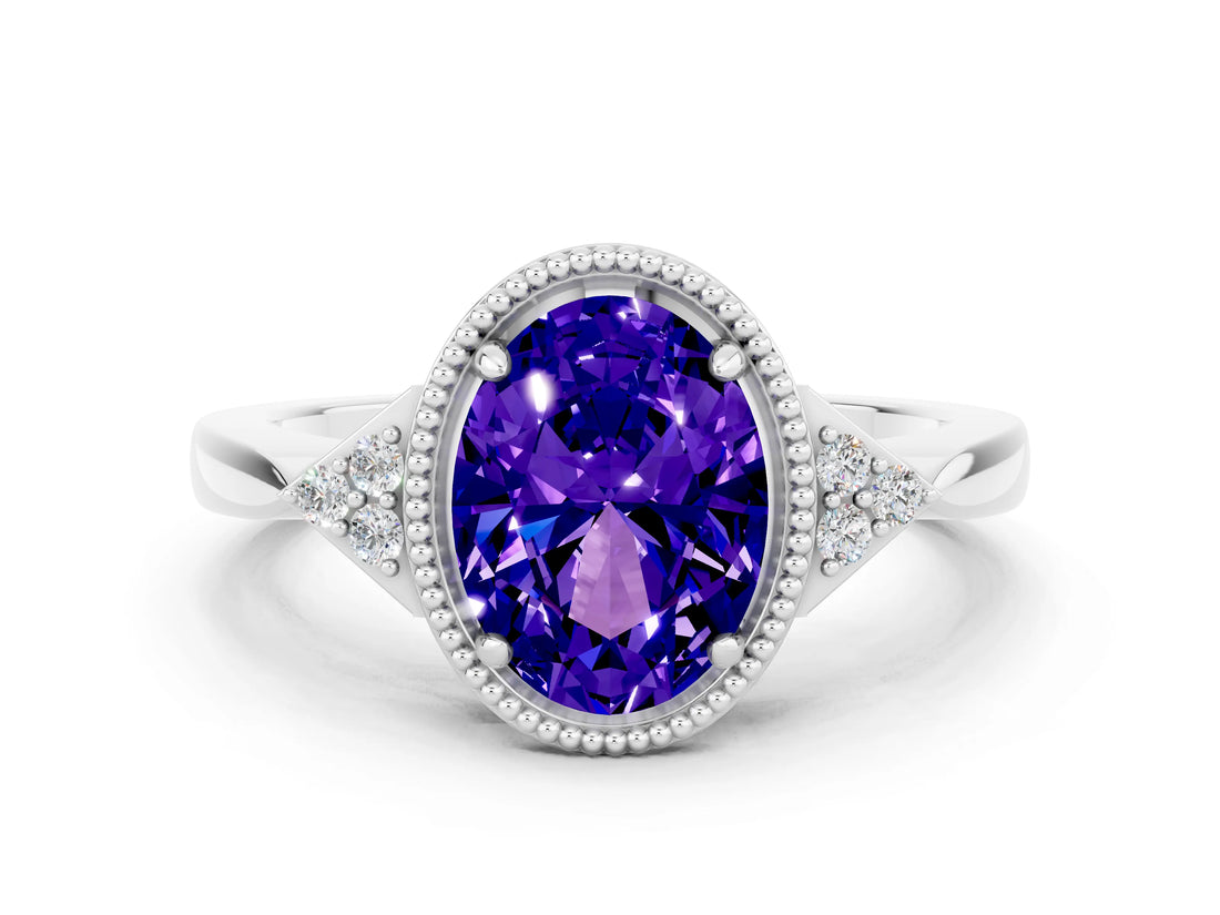 White gold Oval Cut Tanzanite Halo Ring with Tapered Band and Four-Prong Setting
