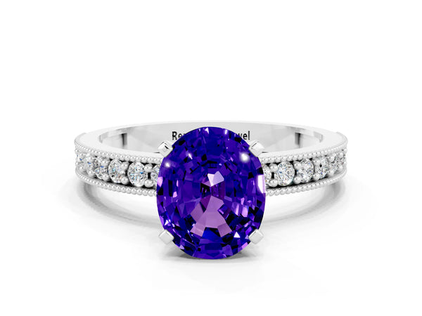 Platinum Oval Cut Tanzanite Milgrain Pavé Engagement Ring with Four-Prong Setting