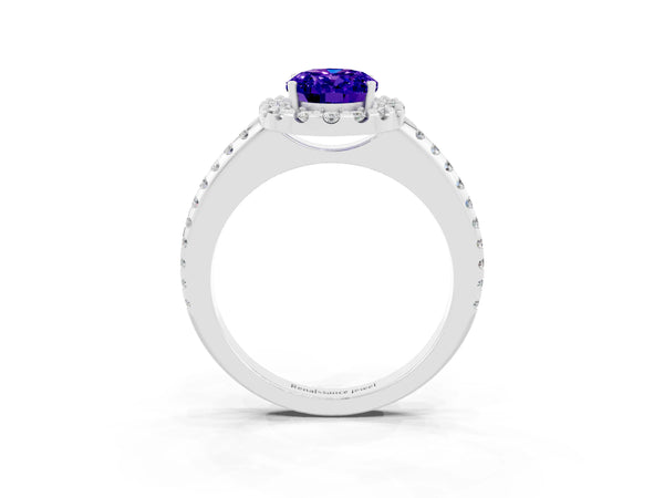 Silver Oval Cut Tanzanite Pavé Halo Ring with Four-Prong Setting
