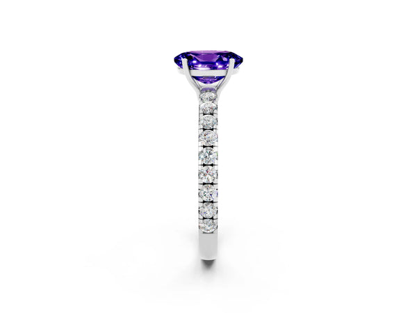 Silver Oval Cut Tanzanite Pavé Solitaire Engagement Ring with Four-Prong Setting