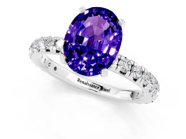 Platinum Oval Cut Tanzanite Pavé Solitaire Ring with Round Band and Prong Setting