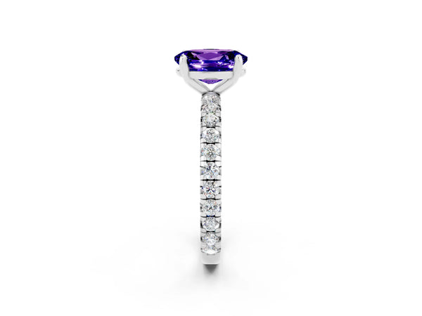 Platinum Oval Cut Tanzanite Pavé Solitaire Ring with Round Band and Prong Setting