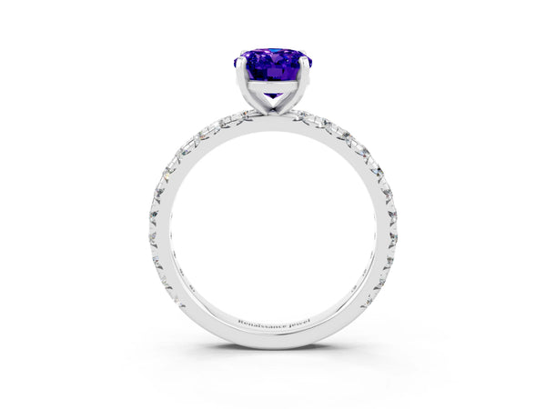 Silver Oval Cut Tanzanite Pavé Solitaire Ring with Round Band and Prong Setting