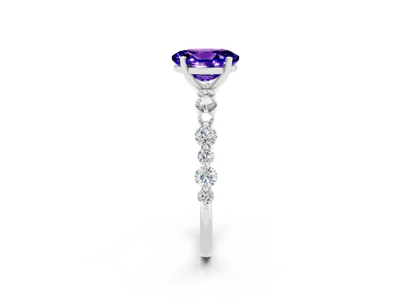 Platinum Oval Cut Tanzanite Prong Set Engagement Ring with Pavé Band
