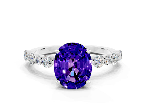 Silver Oval Cut Tanzanite Prong Set Engagement Ring with Pavé Band
