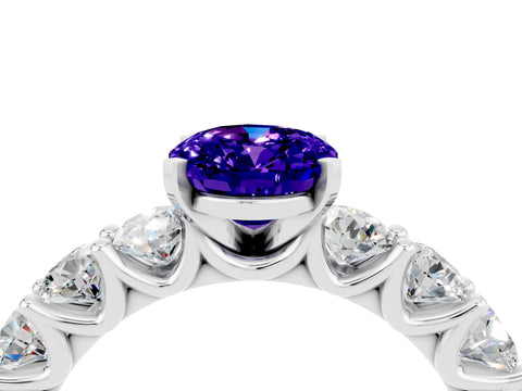 White gold Oval Cut Tanzanite Prong Setting with Side Stones on a Pave Band_4