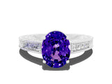 White gold Oval Cut Tanzanite Ring with Milgrain Pavé Band and Four-Prong Setting_12