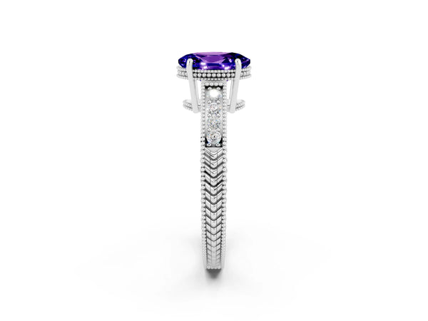 Silver Oval Cut Tanzanite Ring with Milgrain Pavé Band and Four-Prong Setting
