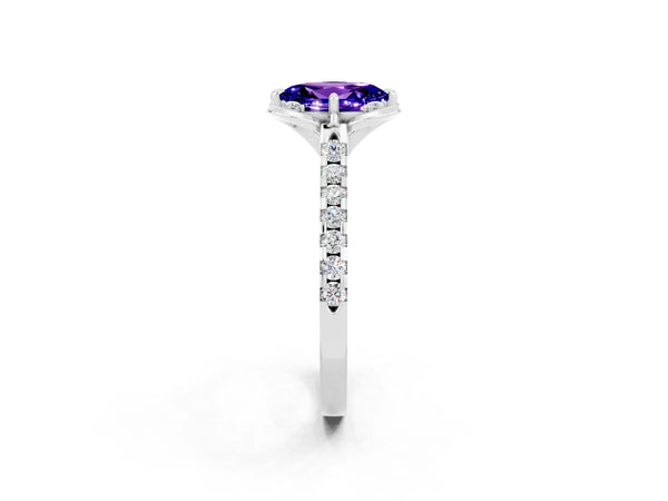 Platinum Oval Cut Tanzanite Ring with Pavé Band and Floral Prong Setting