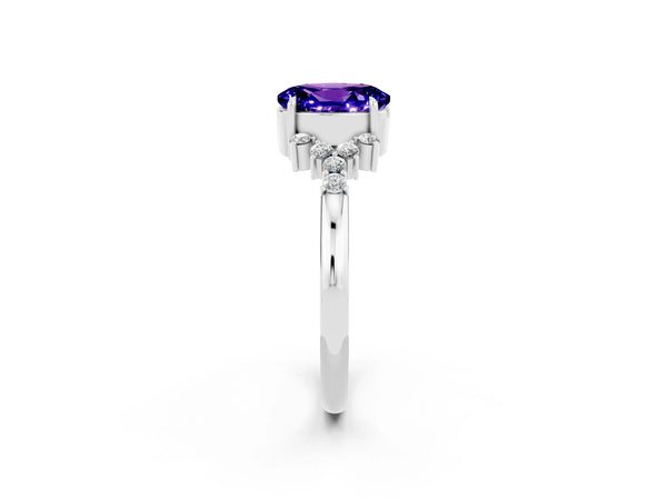White gold Oval Cut Tanzanite Ring with Side Stones and Four-Prong Setting