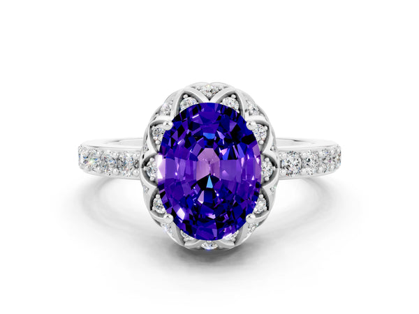 Silver Oval Cut Tanzanite Scalloped Halo Engagement Ring with Round Shared Prong Band
