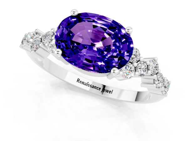 Platinum Oval Cut Tanzanite Scattered Round Accent Ring with Prong Setting