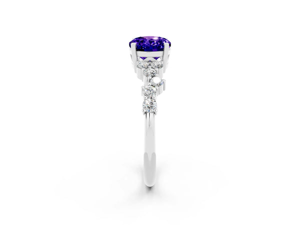 Platinum Oval Cut Tanzanite Scattered Round Accent Ring with Prong Setting