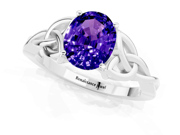 White gold Oval Cut Tanzanite Solitaire Celtic Knot Ring with Four-Prong Setting