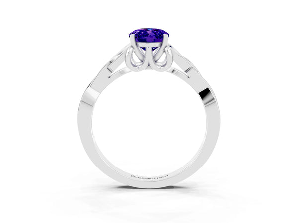 Silver Oval Cut Tanzanite Solitaire Celtic Knot Ring with Four-Prong Setting