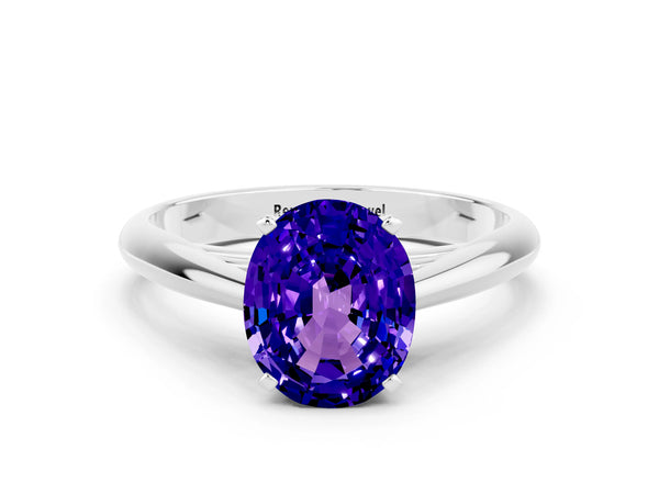 Silver Oval Cut Tanzanite Solitaire Engagement Ring with Cathedral Setting and Four-Prong Mount