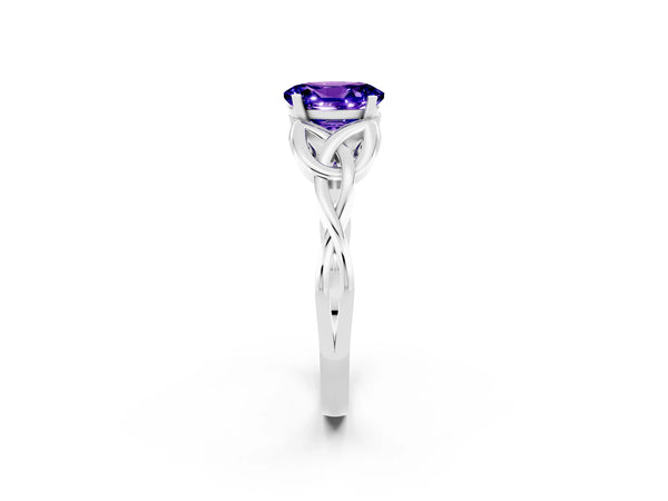 Silver Oval Cut Tanzanite Solitaire Engagement Ring with Celtic Knot Band and Four-Prong Setting