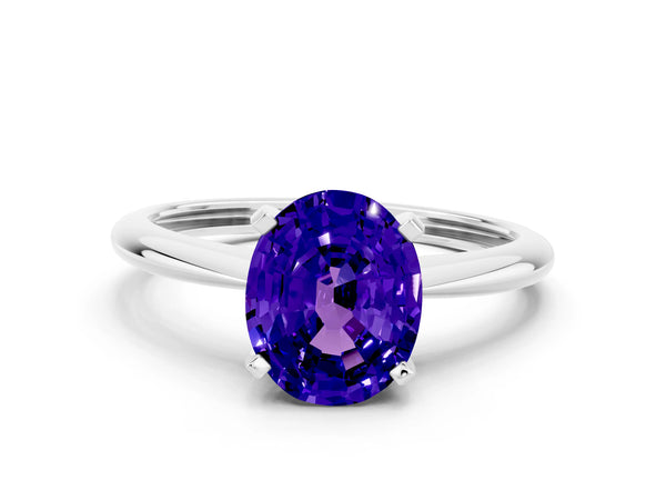 White gold Oval Cut Tanzanite Solitaire Engagement Ring with Classic Band and Four-Prong Setting