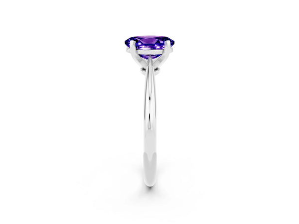 White gold Oval Cut Tanzanite Solitaire Engagement Ring with Classic Band and Four-Prong Setting