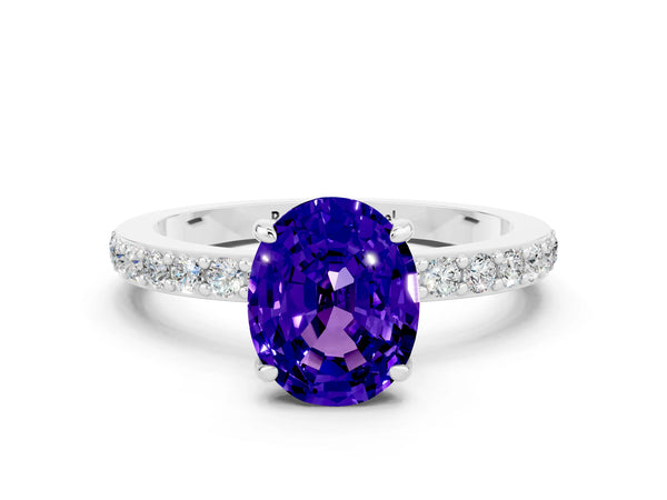 Silver Oval Cut Tanzanite Solitaire Engagement Ring with Pavé Band and Four-Prong Setting