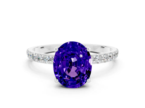 White gold Oval Cut Tanzanite Solitaire Engagement Ring with Pavé Band and Prong Setting