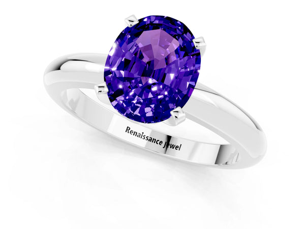 Silver Oval Cut Tanzanite Solitaire Engagement Ring with Round Band and Four-Prong Setting
