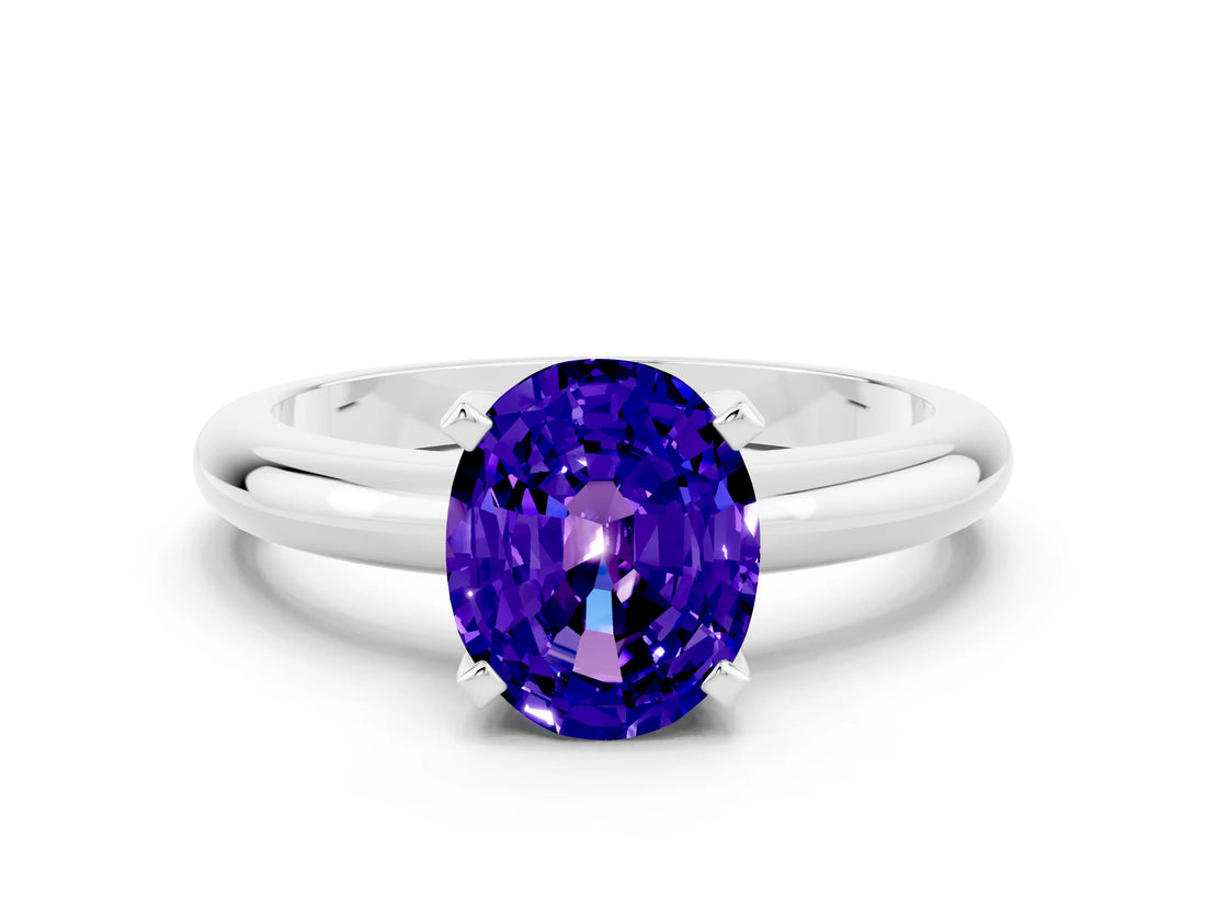 White gold Oval Cut Tanzanite Solitaire Engagement Ring with Round Band and Four-Prong Setting