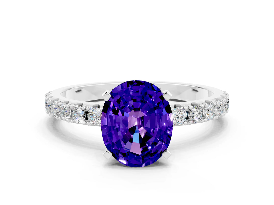 White gold Oval Cut Tanzanite Solitaire Pavé Band with Four-Prong Setting