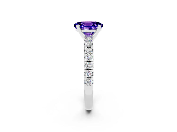 Silver Oval Cut Tanzanite Solitaire Pavé Engagement Ring with Round Band and Prong Setting