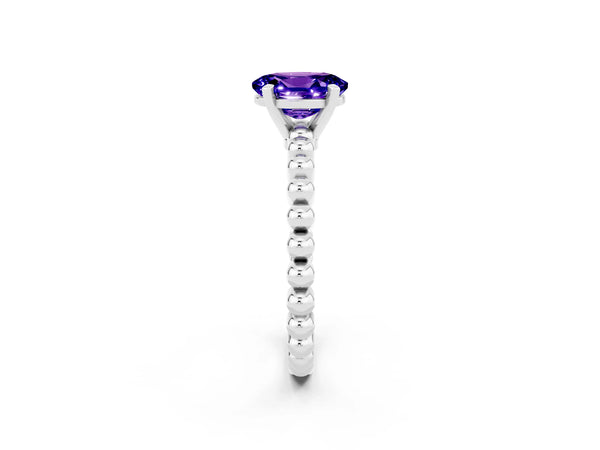 Platinum Oval Cut Tanzanite Solitaire Ring with Beaded Band and Prong Setting