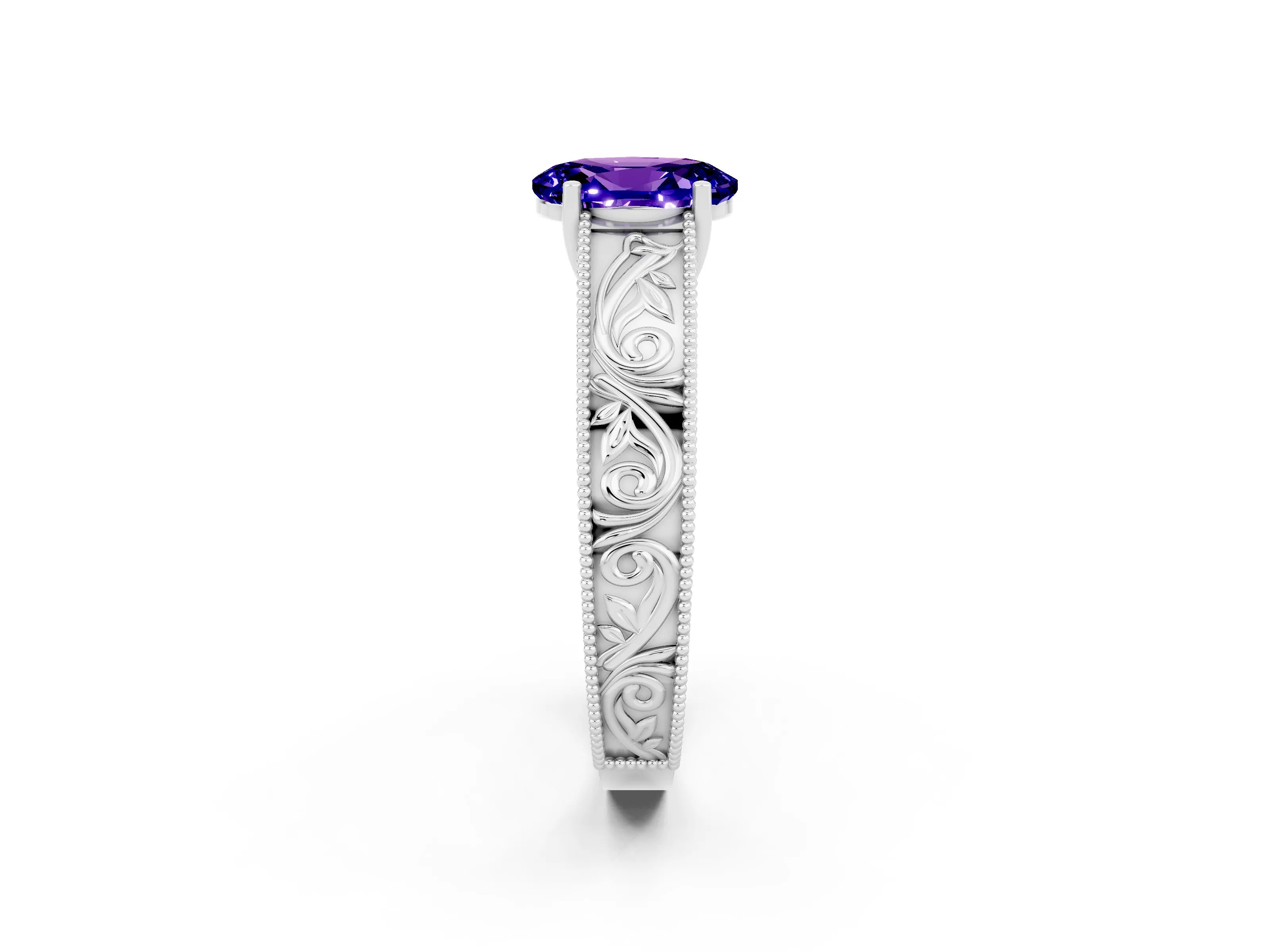White gold Oval Cut Tanzanite Solitaire Ring with Engraved Band and Four-Prong Setting_2