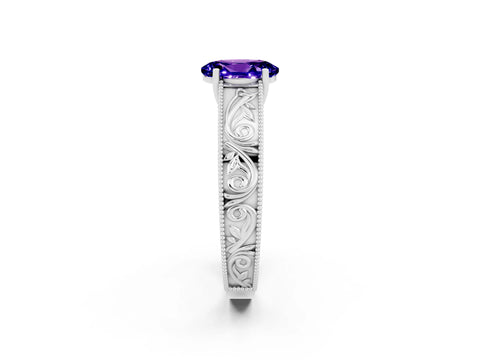 White gold Oval Cut Tanzanite Solitaire Ring with Engraved Band and Four-Prong Setting_2
