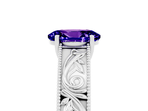 White gold Oval Cut Tanzanite Solitaire Ring with Engraved Band and Four-Prong Setting_5
